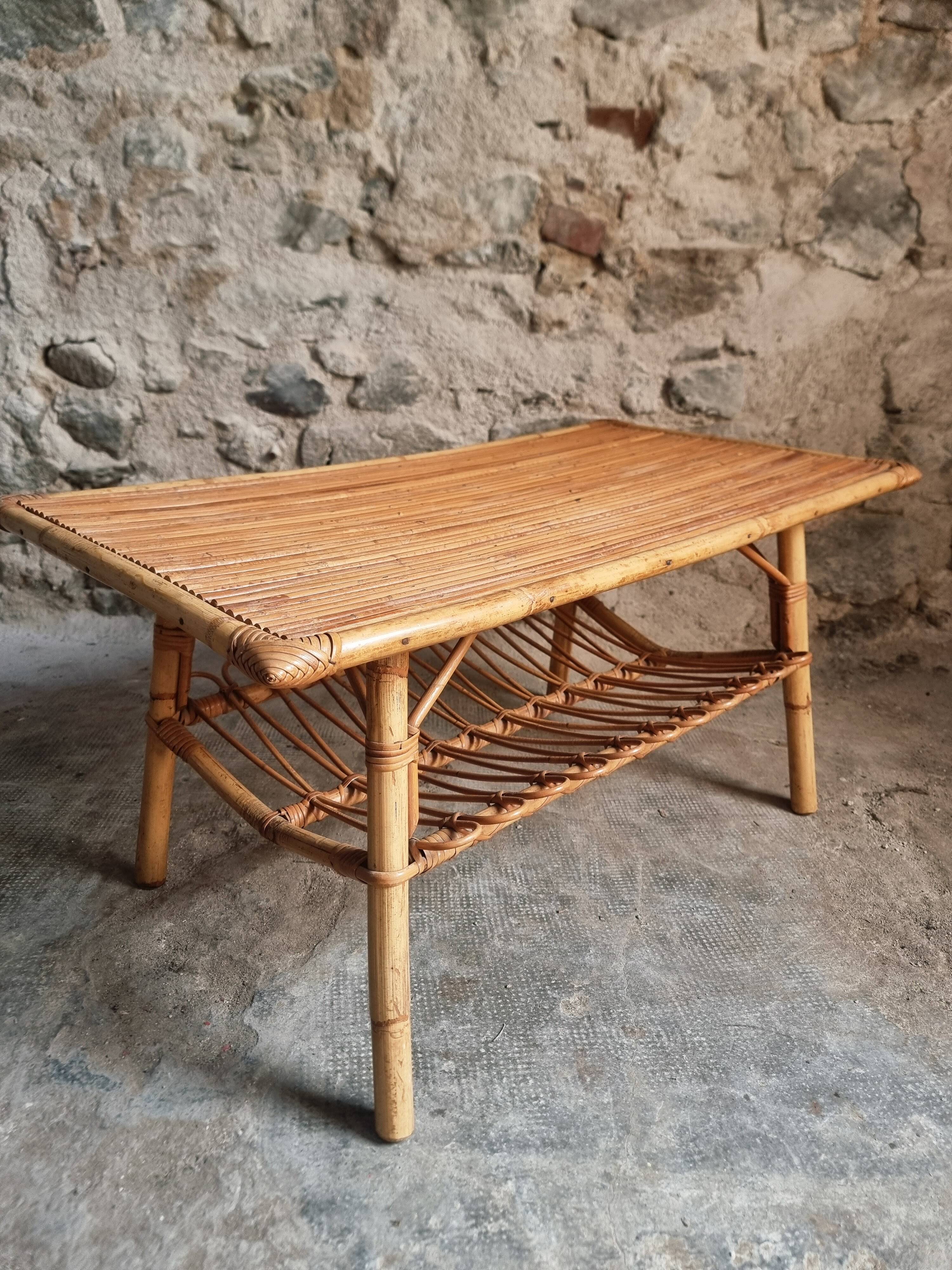 Vintage bamboo and rattan coffee table with magazine rack, French, circa 1960–1970.