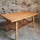 Vintage bamboo and rattan coffee table with magazine rack, French, circa 1960–1970.