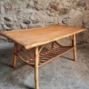 Vintage bamboo and rattan coffee table with magazine rack, French, circa 1960–1970.