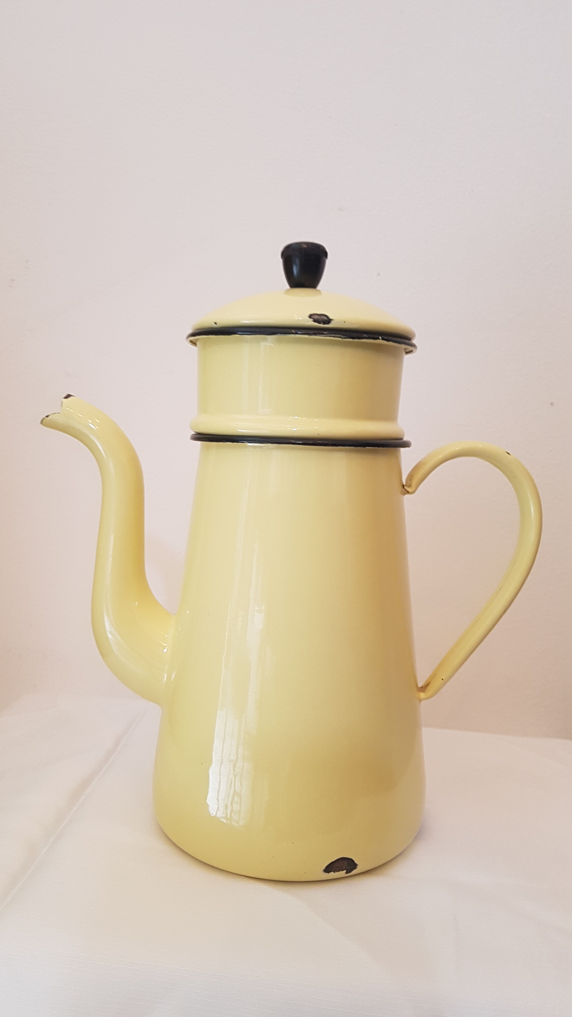Old pale yellow enamelled coffee maker