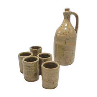 Stoneware bottle and 5 cups
