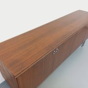 Vintage modernist enfilade in rosewood and chrome metal from the 60s and 70s.