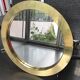 Miroir rond en laiton acier doré 66 x 66 cm