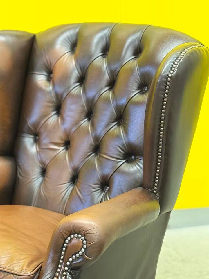 Dark Brown leather chesterfield wing chair with Ottoman