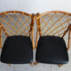 Pair of rattan and black skai bamboo chairs, 60s
