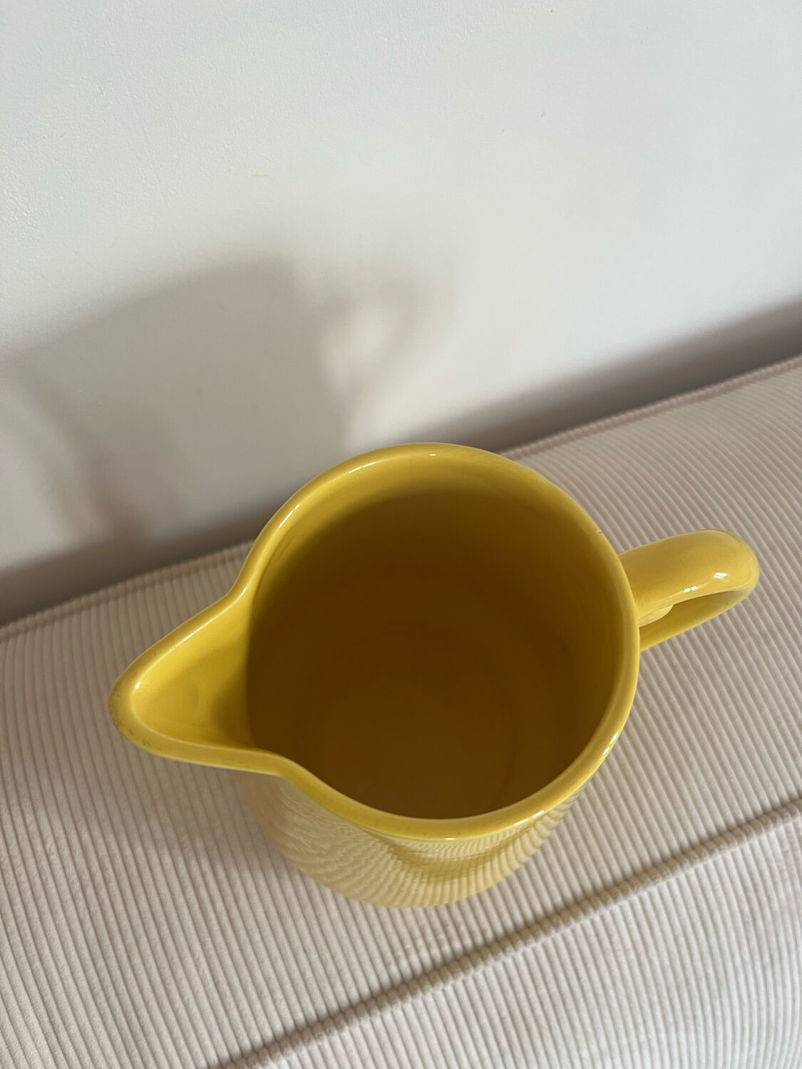 Vintage ceramic yellow pitcher