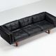 Illum Wikkelso model V11 sofa in black leather by Holger Christiansen, Denmark, 1960
