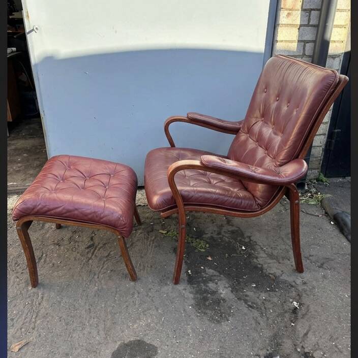 Scandinavian armchair with footrest