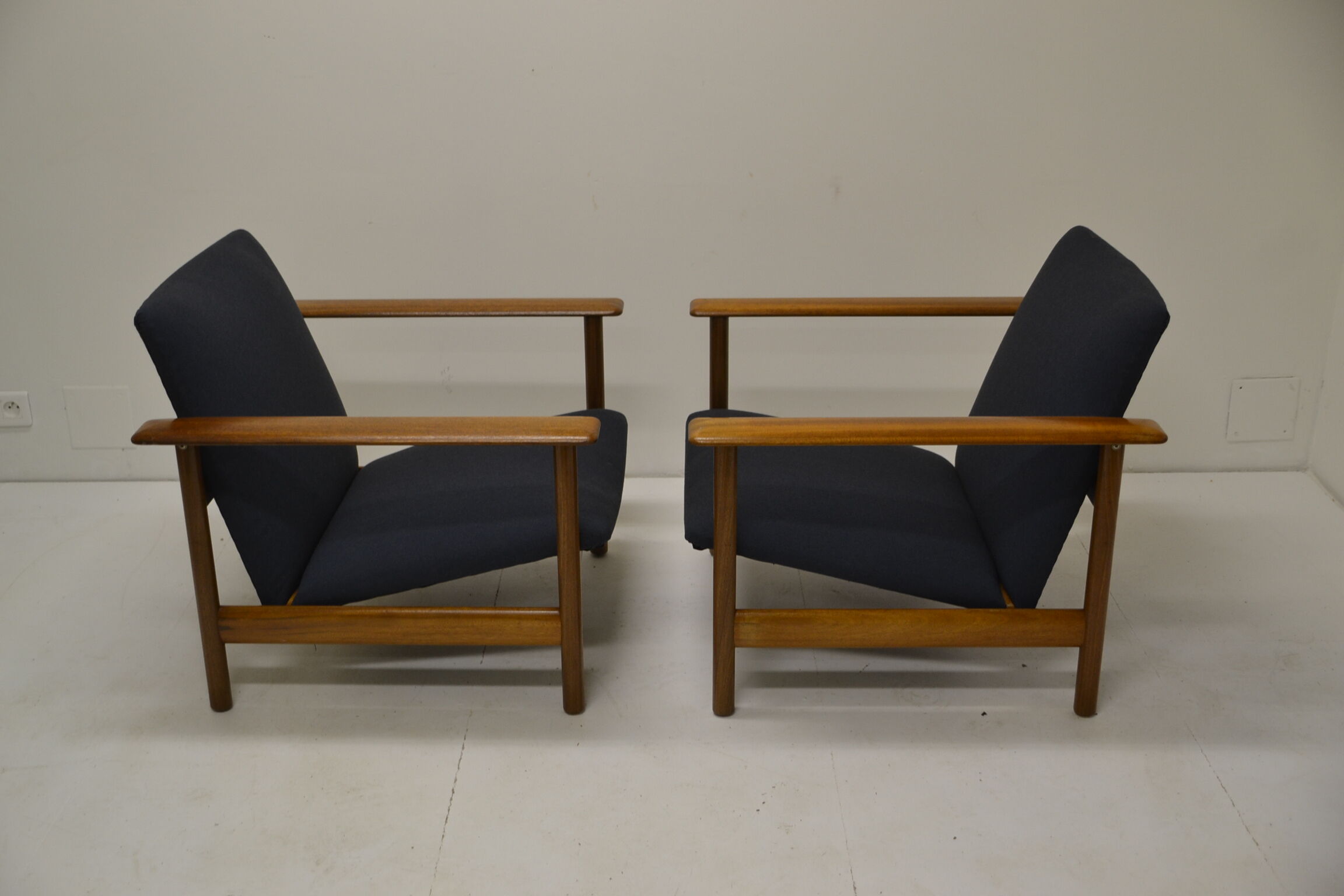 Pair of chairs of Gilbert Steiner mahogany and blue fabrics