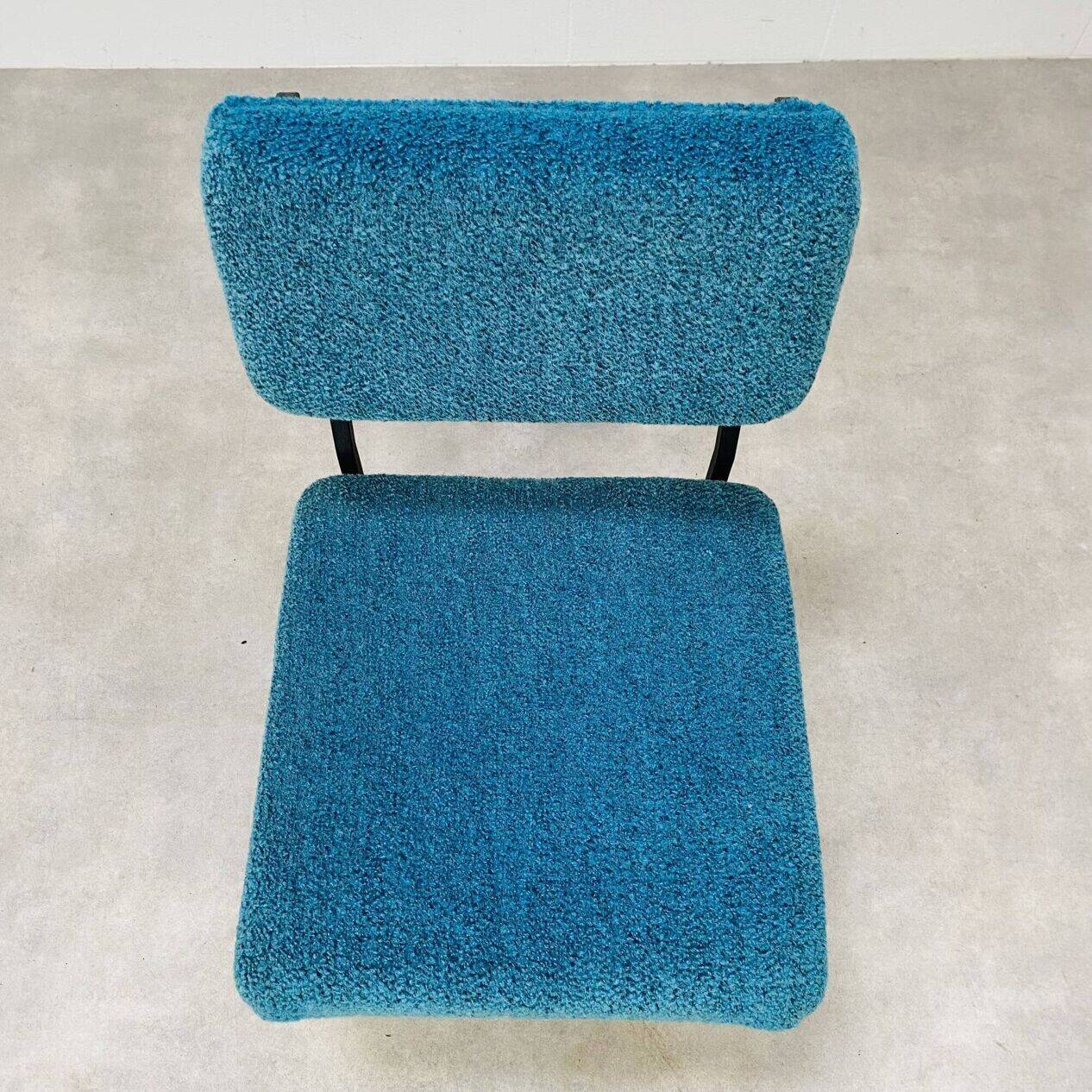 Modernist armchair from the 1950s in vintage blue boucle fabric.