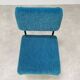 Modernist armchair from the 1950s in vintage blue boucle fabric.
