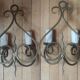 Old pair of wrought iron wall lights