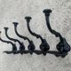 Set of 5 old cast iron hooks