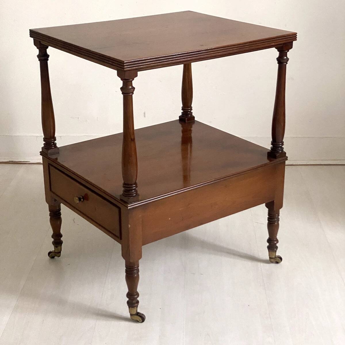 Side table in mahogany and mahogany veneer, 19th century.