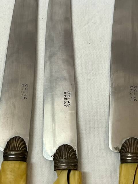 11 bakelite and silver knives early 20th