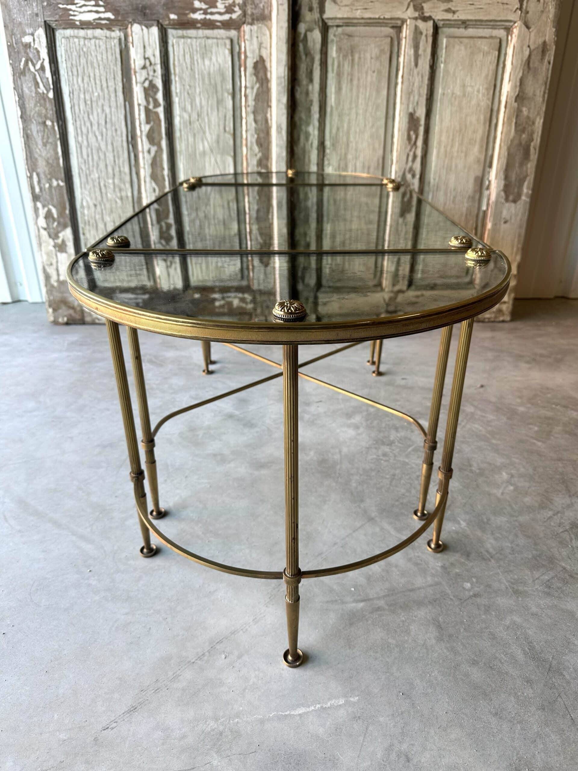 Tripartite coffee table attributed to Maison Baguès.