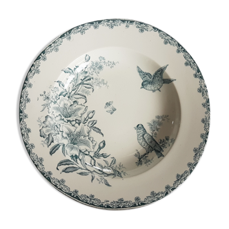 Dish faience of decoration of bird