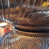 Smoked glass bowl with a radiating embossed pattern — 1970s