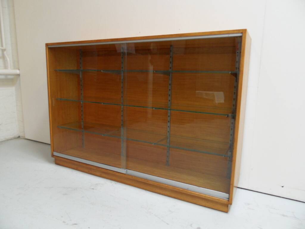Vintage shop display cabinet with sliding doors