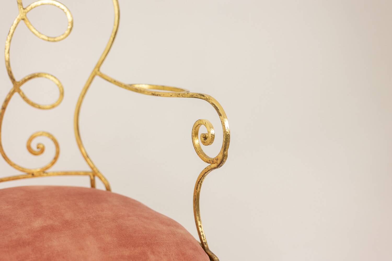 Pair of wrought iron and gilded armchairs, circa 1990