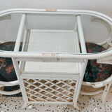 Rattan head-to-head table with vintage armchairs