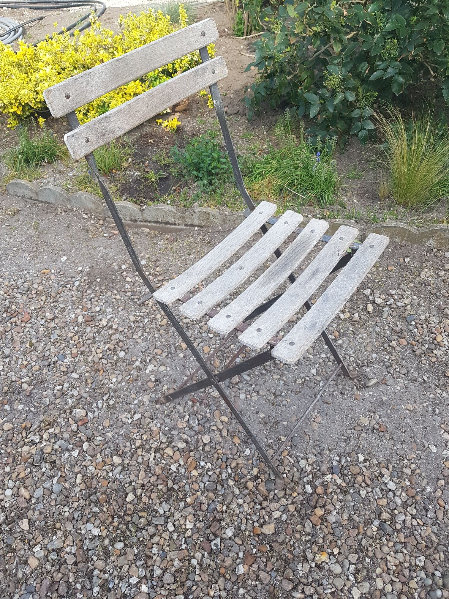 Folding bistro chair with slats