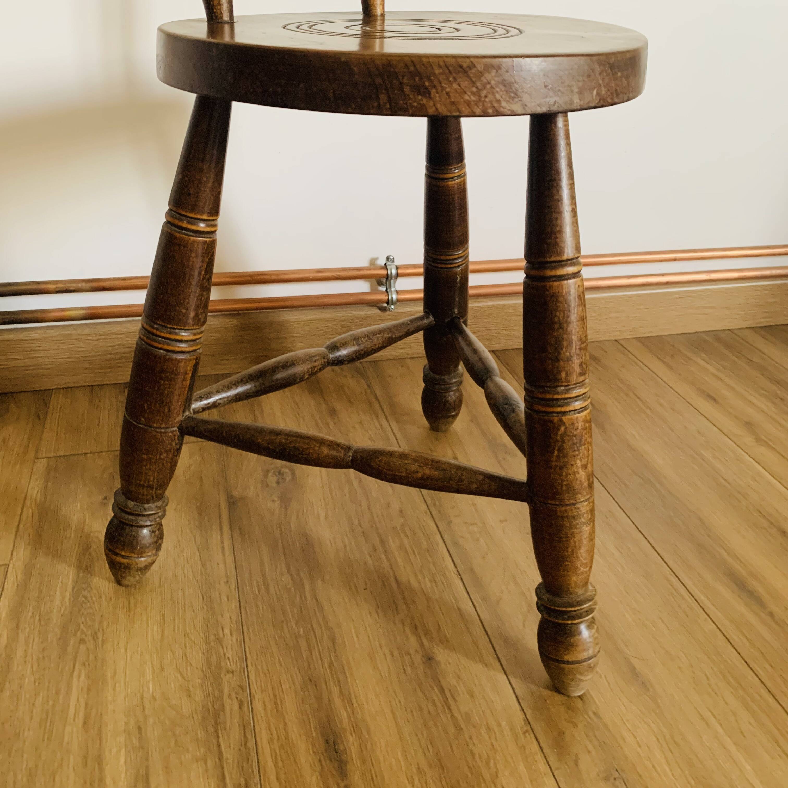 Tripod stool with backrest