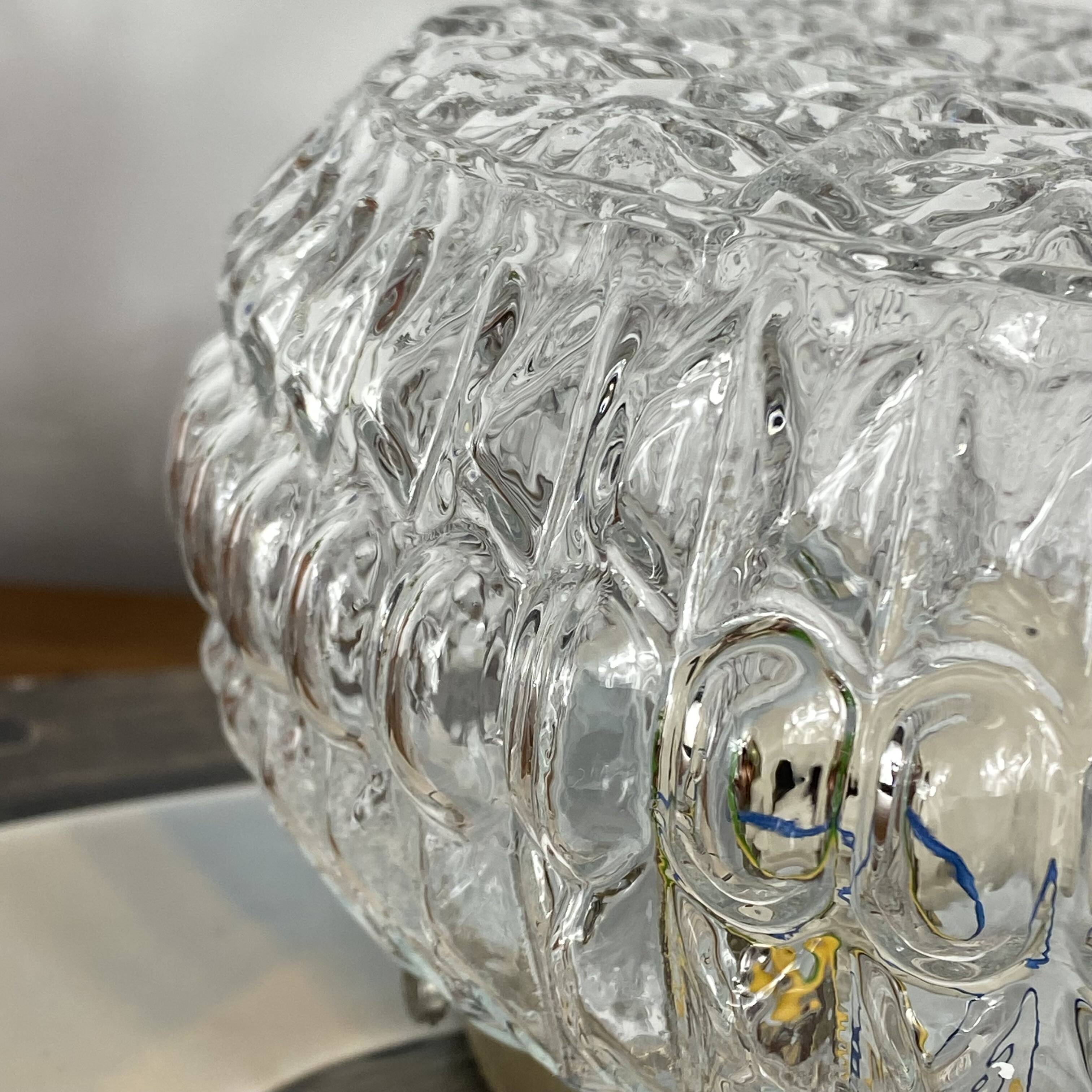 Round wall light ceiling fixture in glass with small vintage flowers from the 1970s and 1980s.