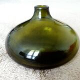Small dark green handmade glass ball vase