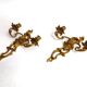 Pair of Rococo wall sconces in gilded bronze, Hollywood Regency, from the years.