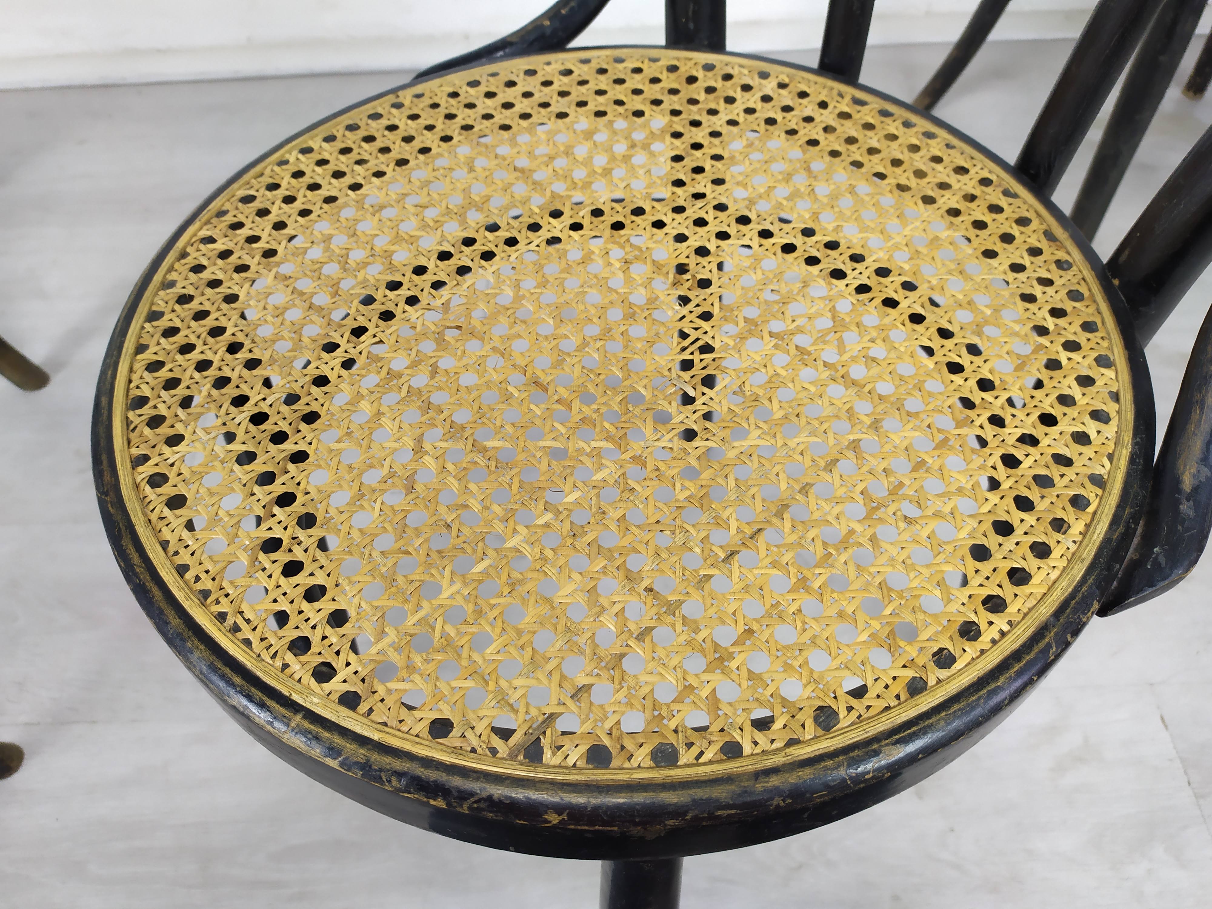 Black canned bistro chairs