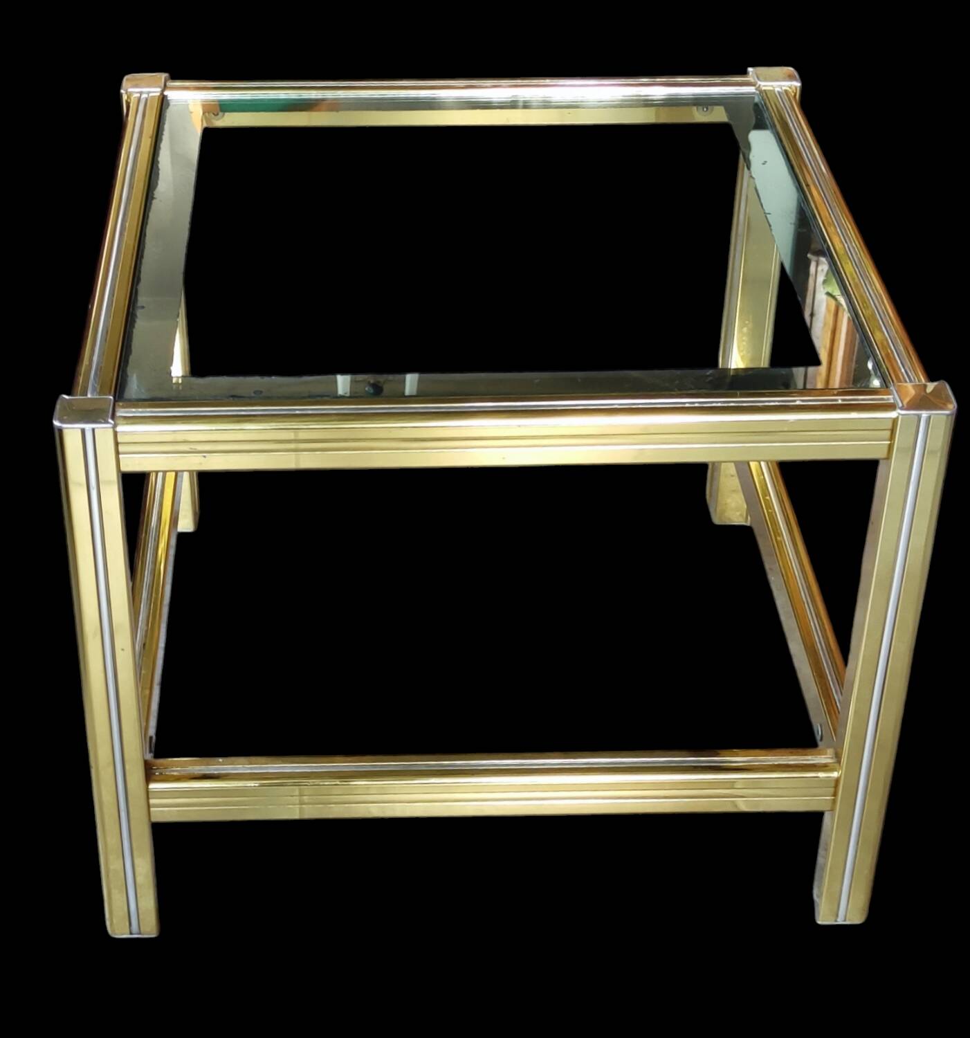 Small designer coffee table in gold metal