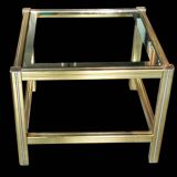 Small designer coffee table in gold metal