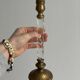 Pair of twisted metal and glass candlesticks