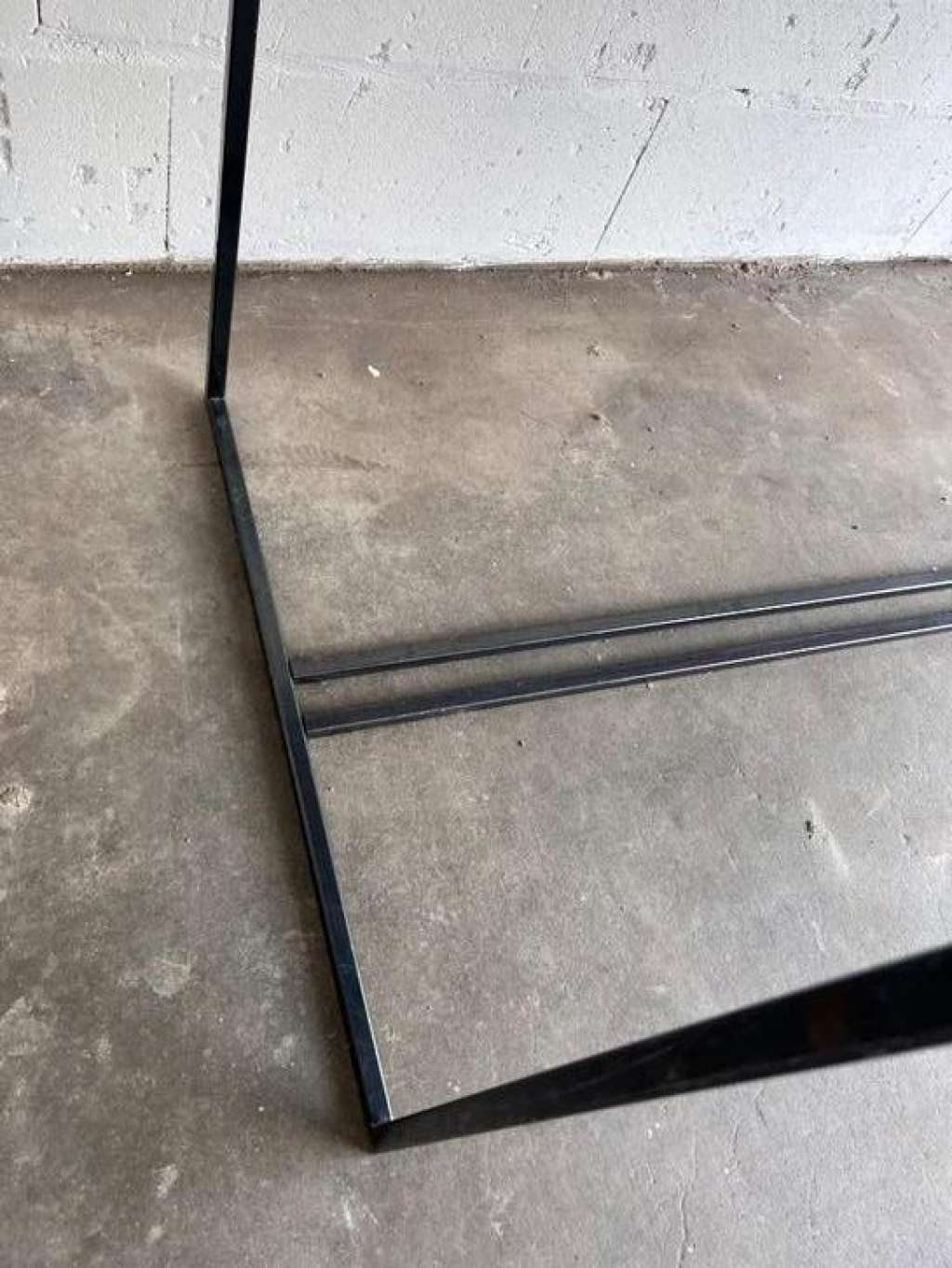 Coffee table in glass and iron