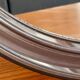 Vintage round smoked plastic mirror, circa 1970s.