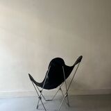 designer butterfly armchair in chrome and black leather