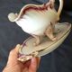 Antique sauce boat in fine earthenware from Sarreguemines, France, neo style.