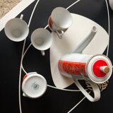 Cafetière orange et 4 tasses et pot à lait motif fleurs