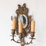 Pair of old French wall lights with beveled mirror and putti
