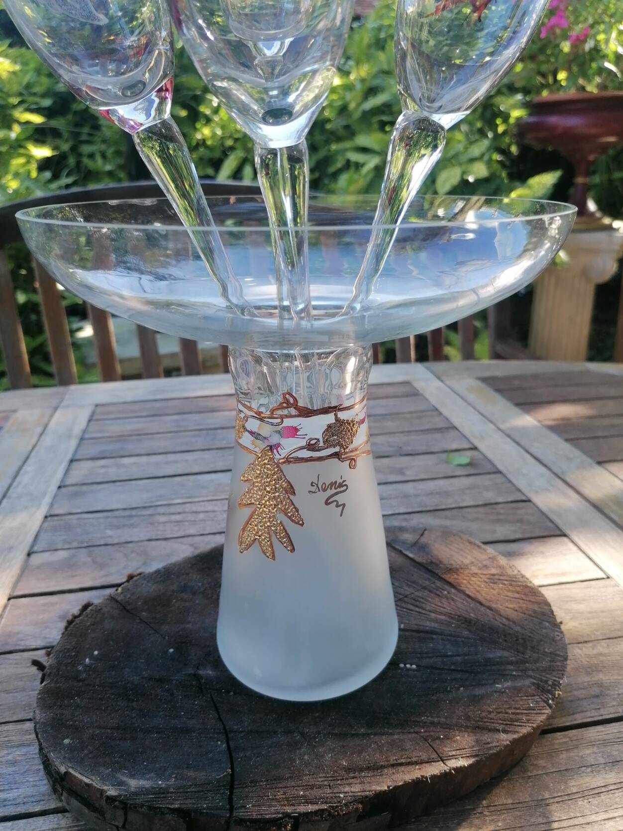 Set of 4 painted blown glass champagne flutes. Signed Denis.