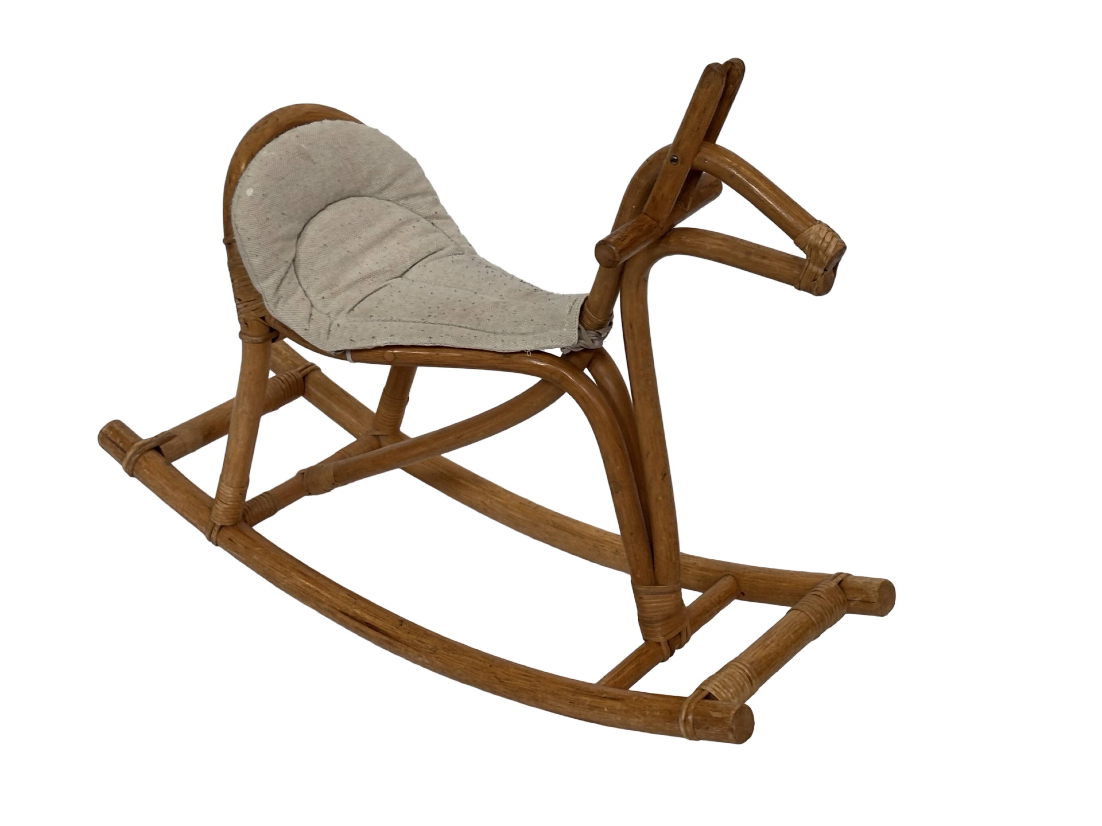 Vintage rattan rocking horse for a 1960s nursery design