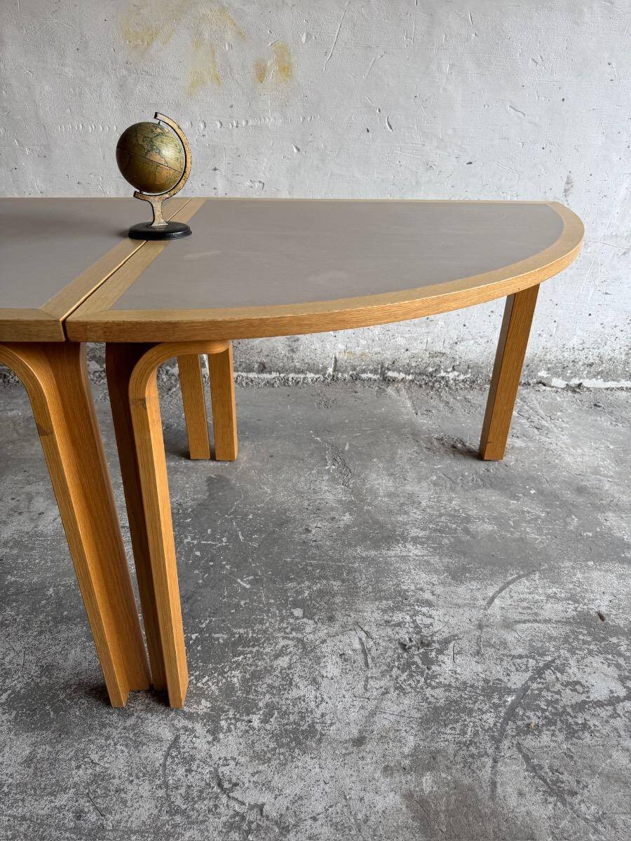 Set of 2 light-grey laminated and beech wood half-round dining tables by Magnus Olesen