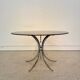 Table ronde vintage années 70 – verre fumé & piètement chrome –