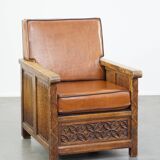 Fauteuil ancien en peau de mouton retapissée