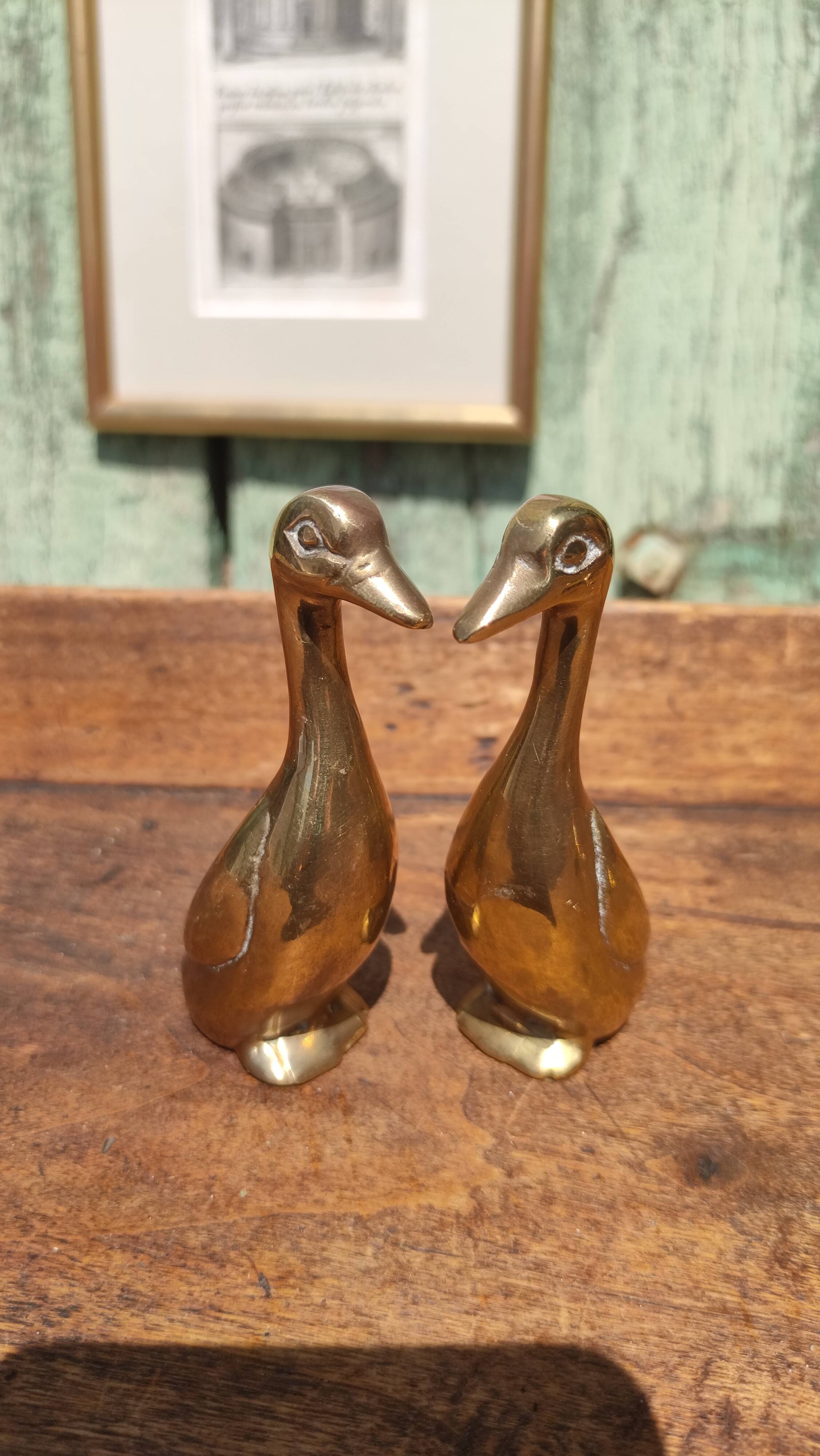 Pair of golden brass ducks