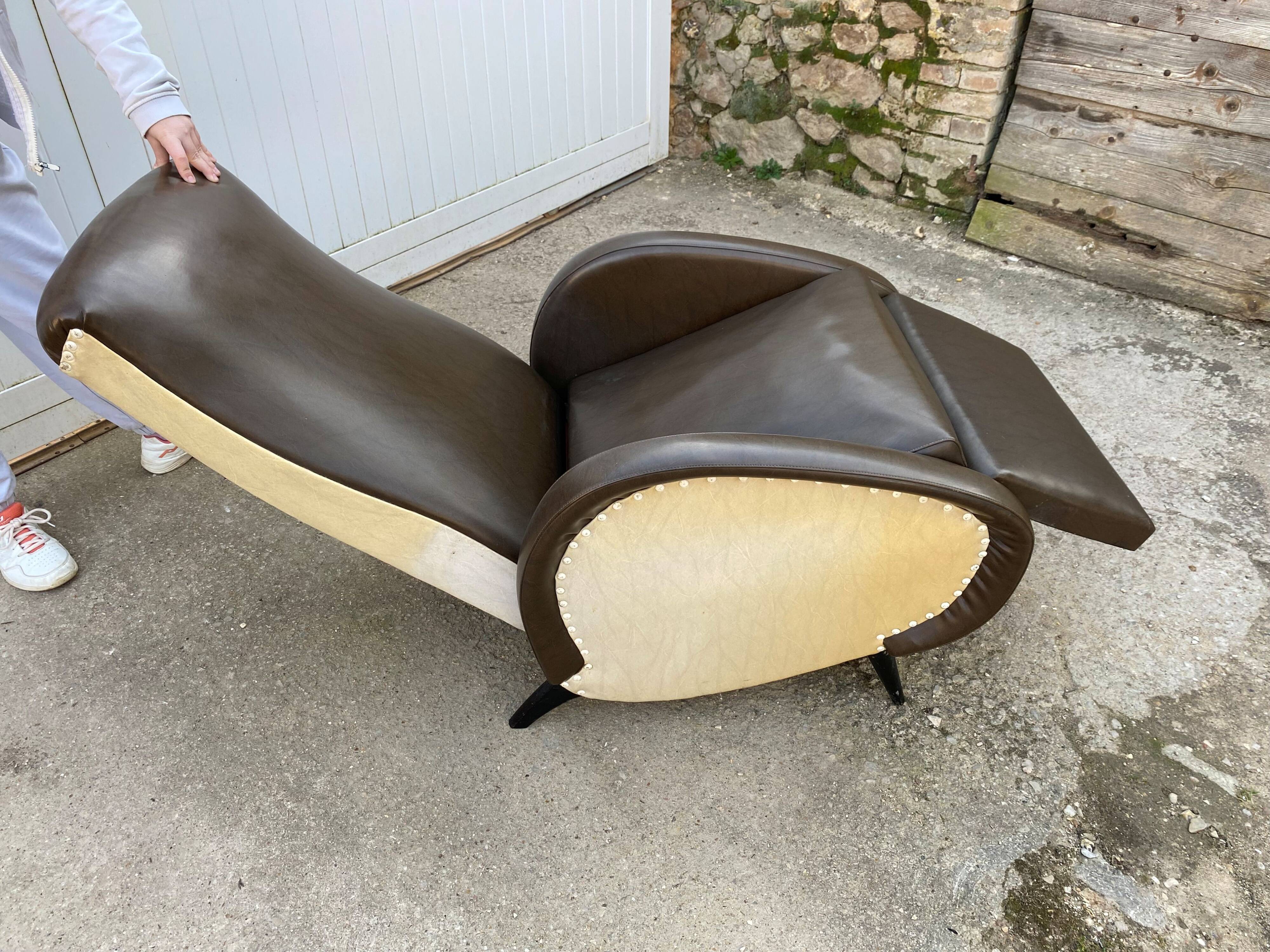 Vintage 50 faux leather reclining lounge chair with footrest