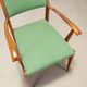Vintage wooden and fabric armchair, Italian design from the 1950s.