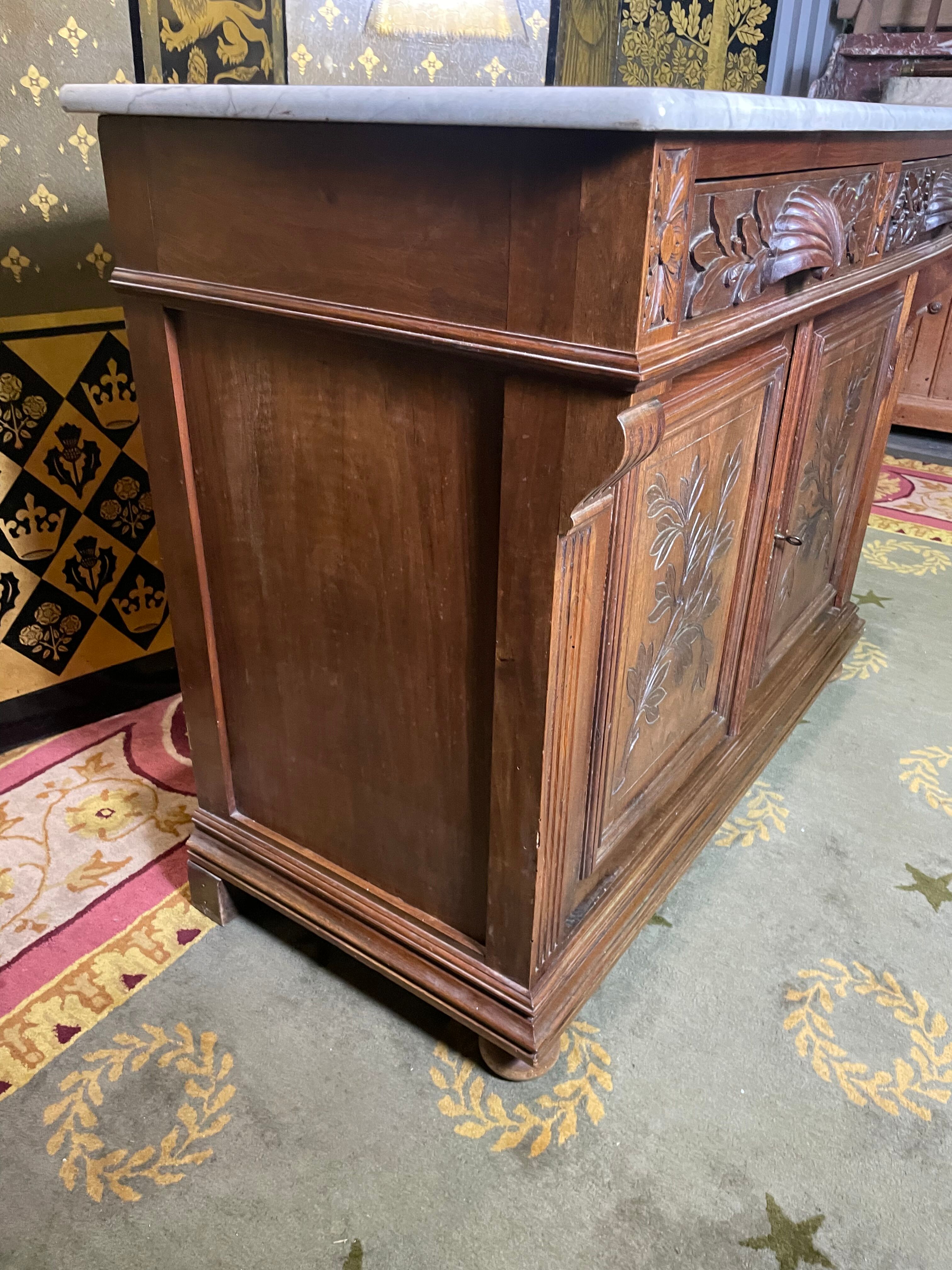Carved walnut vanity