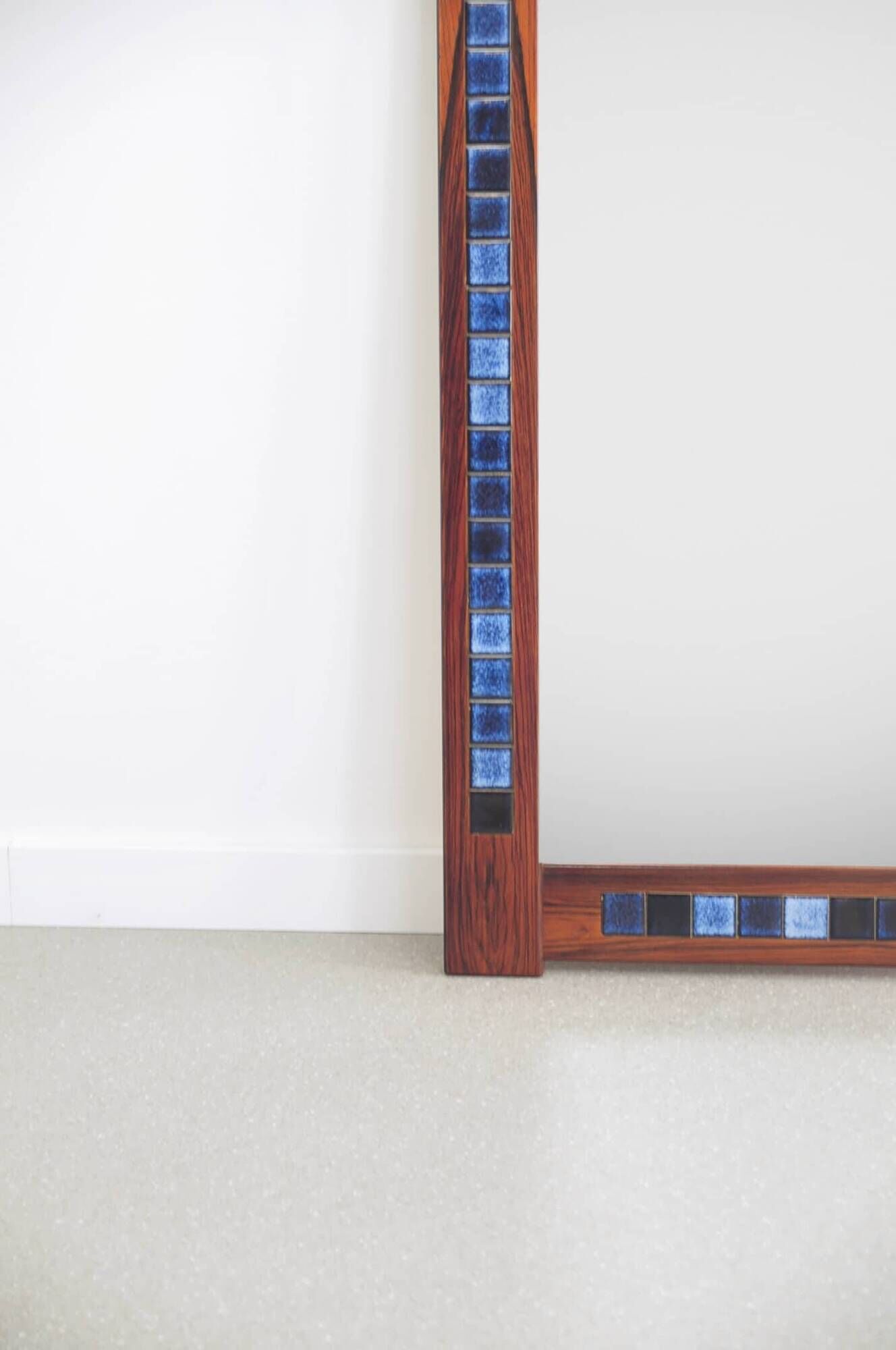 Rosewood mirror with blue ceramic tiles
